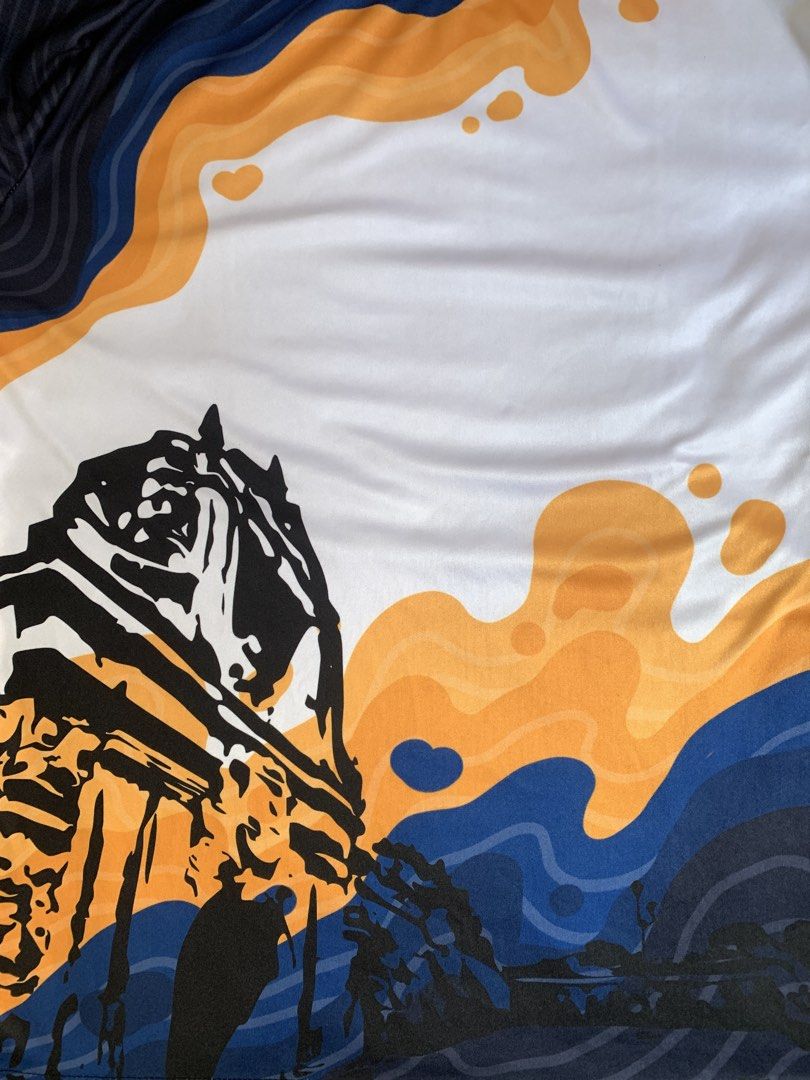 Intramuros Legacy Run T-shirt (Category: Activewear) located in Taguig. Submitted by ahnjr (Listing ID 1461452308, Image 1). Description: - Unique white t-shirt with a cool graphic design. - Features a vertical street sign: 'Intramuros' and 'Legacy Run'. - Abstract shapes in orange, blue, and black add a modern touch. - Comfortable fabric for everyday wear. - Ideal for runners or those who appreciate distinctive designs..