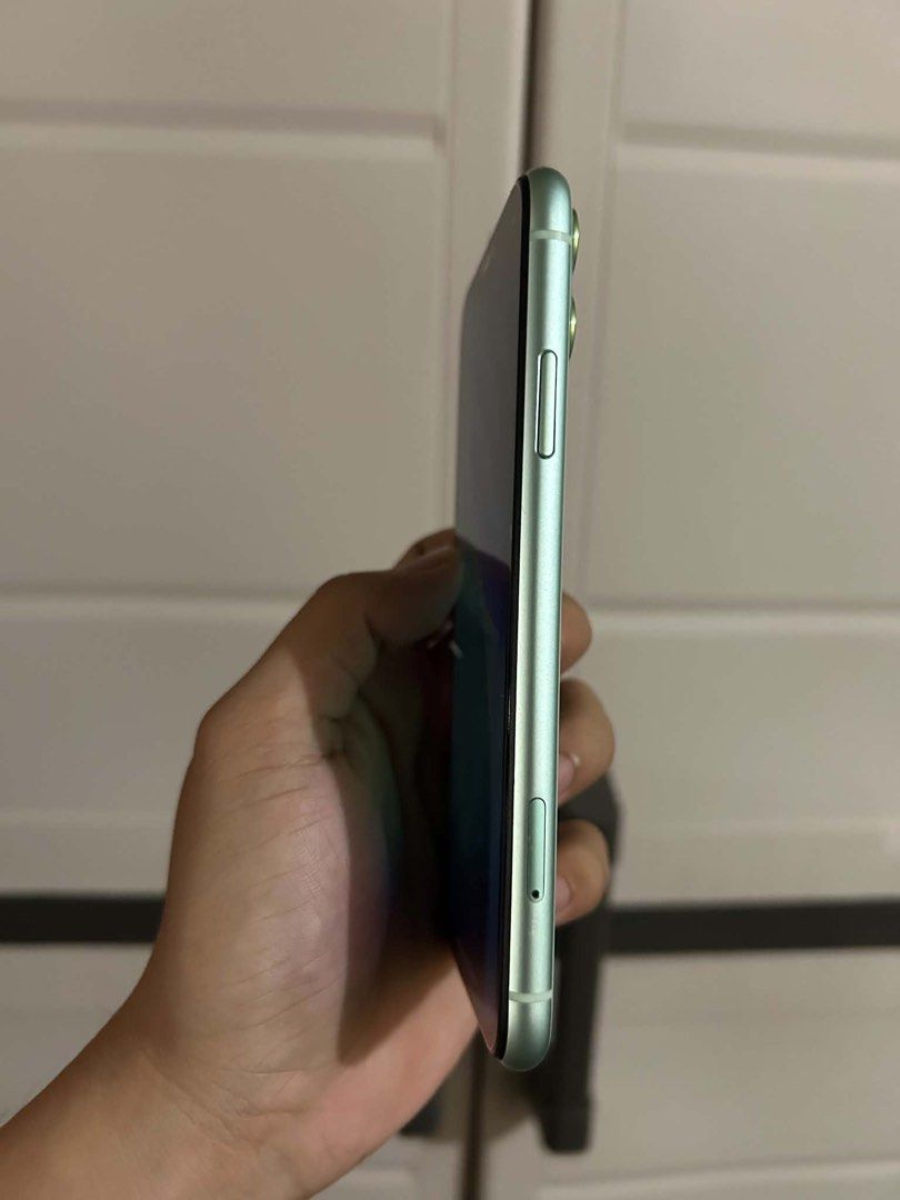 Iphone 11 (Category: iPhone 11 Series) located in Pasay City. Submitted by deguzmanjay (Listing ID 1461517934, Image 3). Description: Iphone 11 Mint Green Color Issue:Space On Left Side Cause Of Lcd Replacement/Loose Charging Pin.