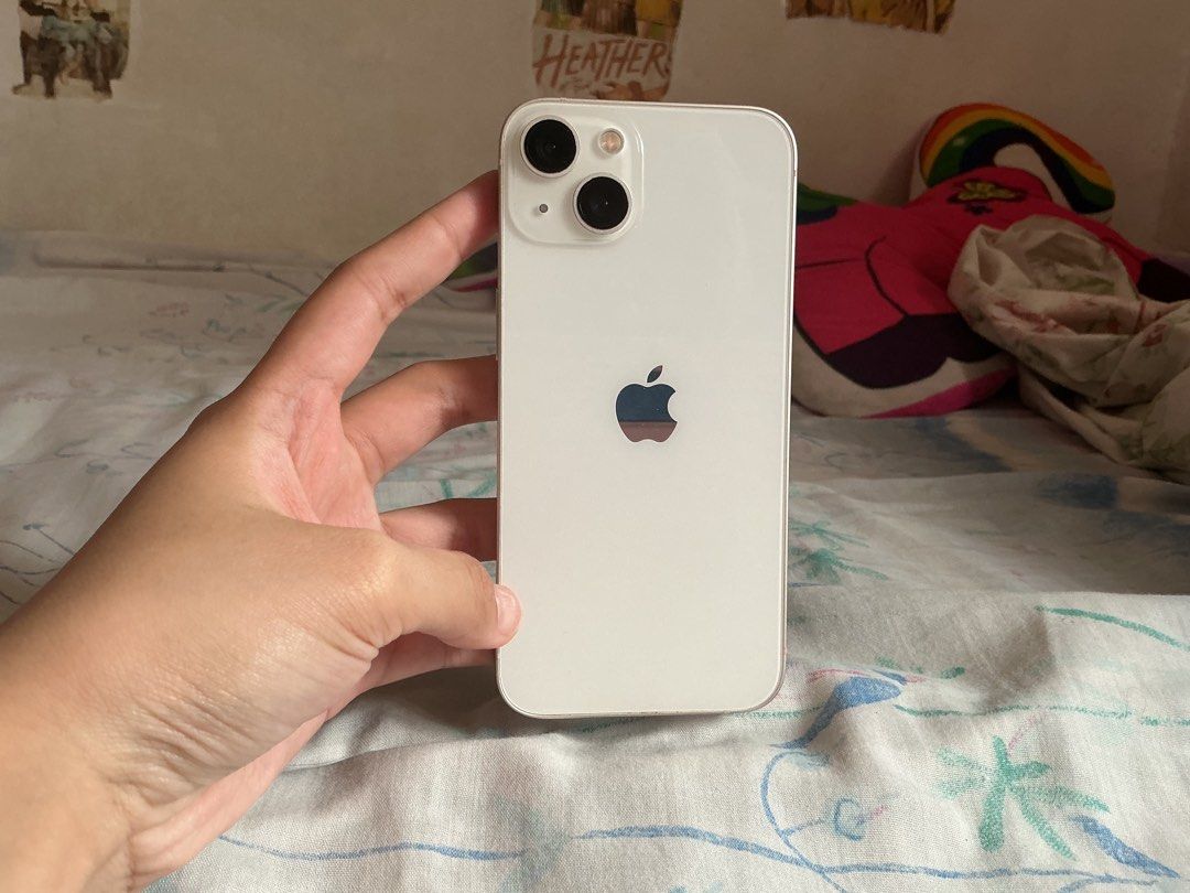 IPHONE 13 128GB STARLIGHT (Category: iPhone 13 Series) located in Las Pinas. Submitted by aggrcola (Listing ID 1461386573, Image 2). Description: For sale iPhone 13 128gb Starlight 18,000 pero nego for sure buyer -No issues, lady owned -87% batt health -True tone, face id all working -No history of repair -With free cases, original charger, original apple earphones lightning, and box with receipt -Unli check and reset PM if interested .