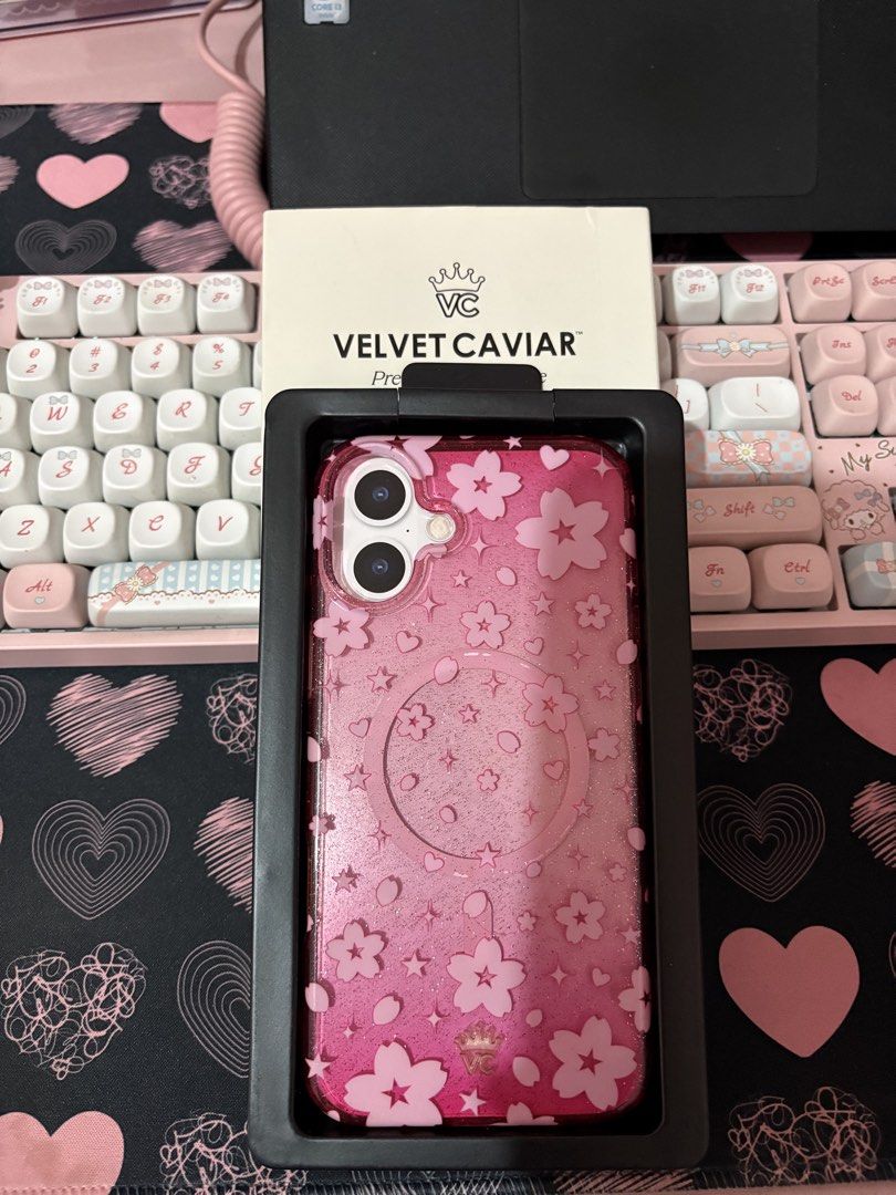 Iphone 16 plus Velvet (Category: Cases & Sleeves) located in Quezon City. Submitted by tonijoydeus (Listing ID 1461516849, Image 1). Description: - Brand: Velvet Caviar - Model: iPhone 16 Plus - Design: Pink with cherry blossom and star pattern - Features: Glitter effect, stylish and protective - Condition: like new.