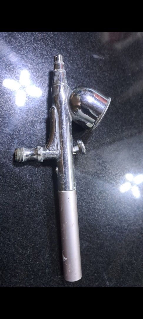 Iwata Airbrush Japan XC (Category: Craft Supplies & Tools) located in Davao. Submitted by bravemoon_556cd5 (Listing ID 1461329993, Image 2). Description: - Genuine Iwata XC Airbrush - Made in Japan - Classic Chrome finish with Tan handle - Minor scuffs on handle, otherwise in good working condition - Ideal for detailed and precise painting projects.