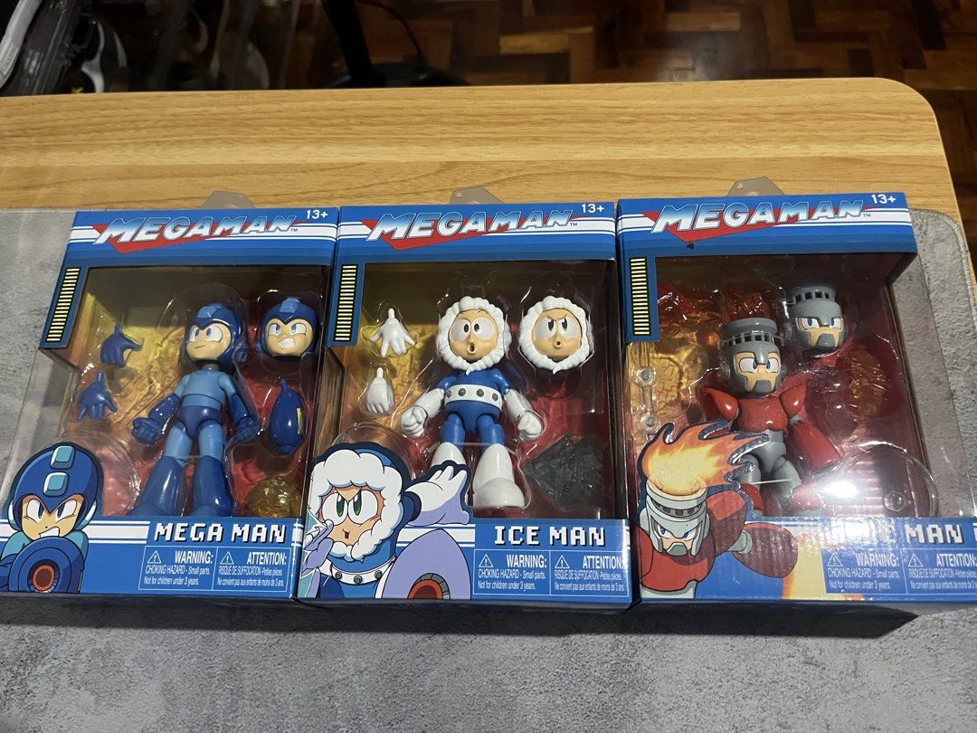 Jada Toys - Mega Man Action Figures Wave 1 (Category: Figurines & Statues) located in Las Pinas. Submitted by eyoyv (Listing ID 1461526623, Image 1). Description: - Set includes Mega Man, Ice Man, and Fire Man action figures. - All figures are brand new and sealed in their original packaging. - Ideal for any Mega Man enthusiast or collector. .