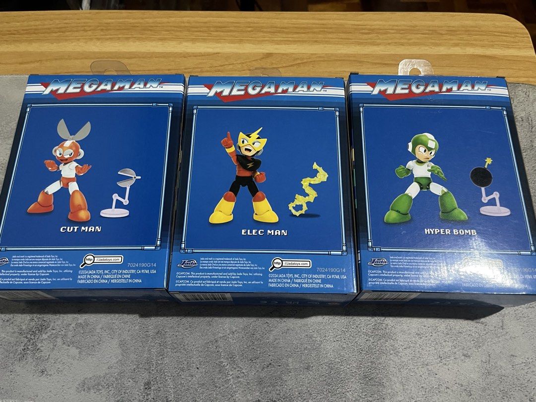 Jada Toys - Mega Man Action Figures Wave 2 (Category: Figurines & Statues) located in Las Pinas. Submitted by eyoyv (Listing ID 1461527031, Image 2). Description: - Set of 3 Mega Man Action Figures - Includes Cut Man, Elec Man, and Hyper Bomb Mega Man - All figures are brand new and sealed in original packaging - Ideal for Mega Man fans and collectors .