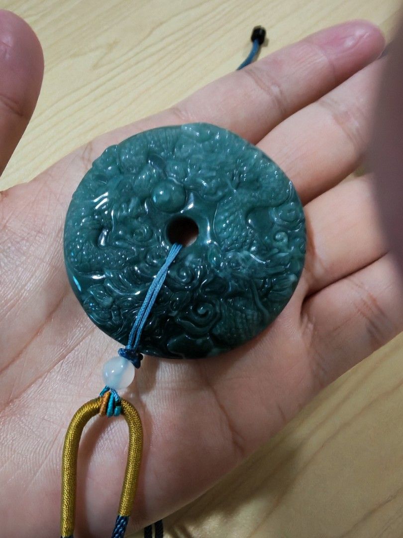 Jade Pendant Donut Dragon Carving (Category: Jewelry) located in Bacoor. Submitted by jadeitemaster (Listing ID 1461344949, Image 1). Description: Type A Guatemala Jadeite Dragon carving Front and back Total of 9Dragons Bluish to white, Bluish to green hue Has weight!.