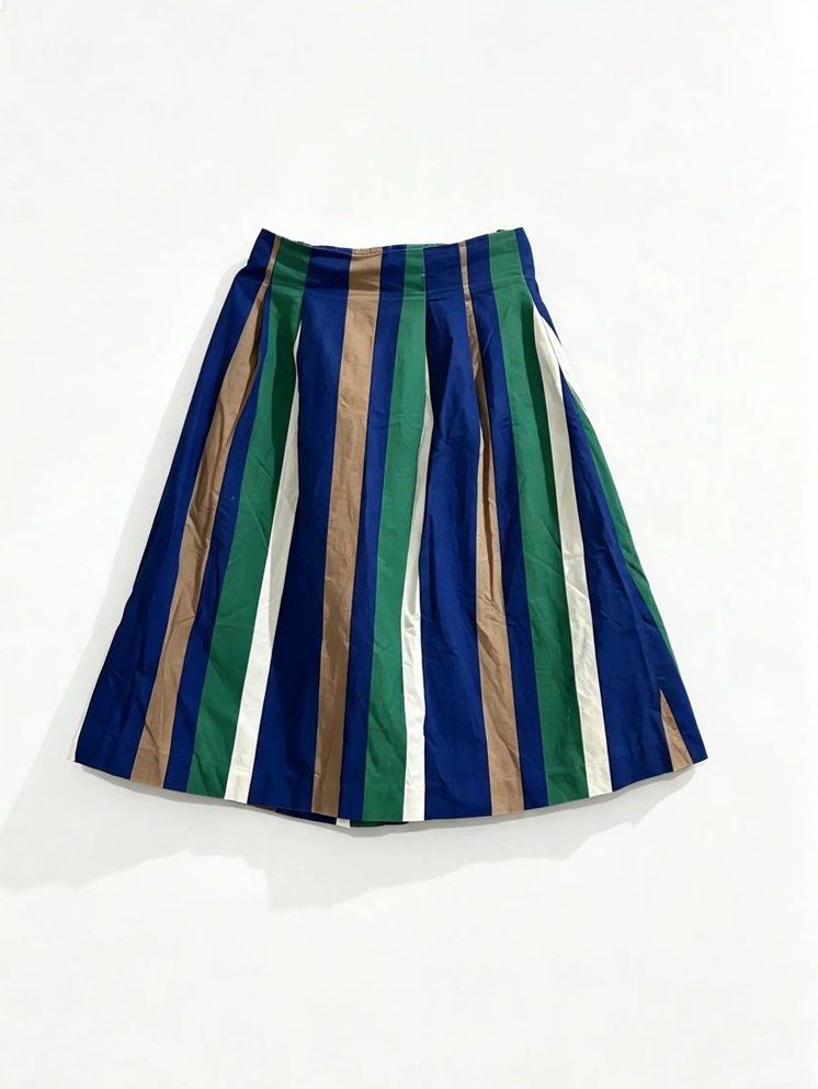 JIL STUART (Category: Skirts) located in Davao. Submitted by sart0ria85 (Listing ID 1461522474, Image 1). Description: A vertical stripes of green,white,blue and brown skirt in a below the knee length. 100% chenile noodle from polyester fabric. MADE IN KOREA 🇰🇷 SMALL. Size 4 VERY GOOD CONDITION (89/100).
