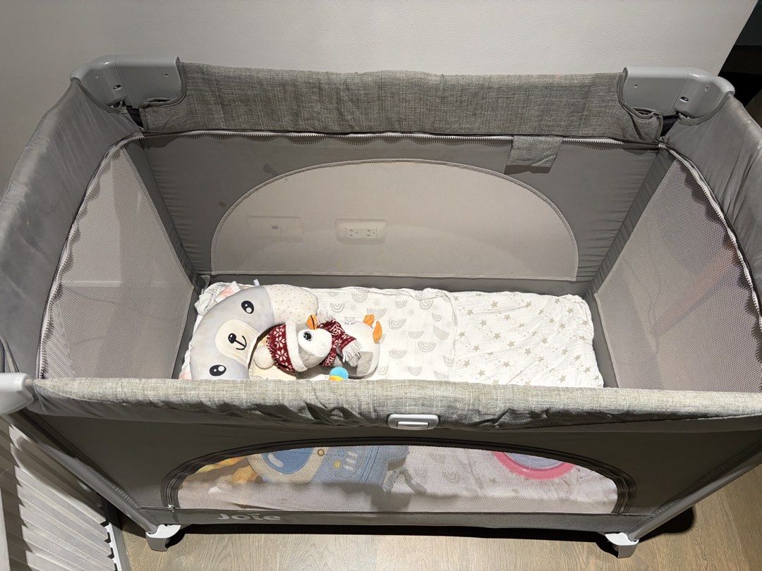 Joie Kubbie Co-Sleeper Crib/Playpen (Category: Cots & Cribs) located in Quezon City. Submitted by absam26 (Listing ID 1461560473, Image 2). Description: - Joie Playpen in Grey - Breathable Mesh Sides for Ventilation - Simple Setup and Fold Mechanism - Includes Comfortable Mattress - Ideal for Home or Travel - Ample Space for Your Child.