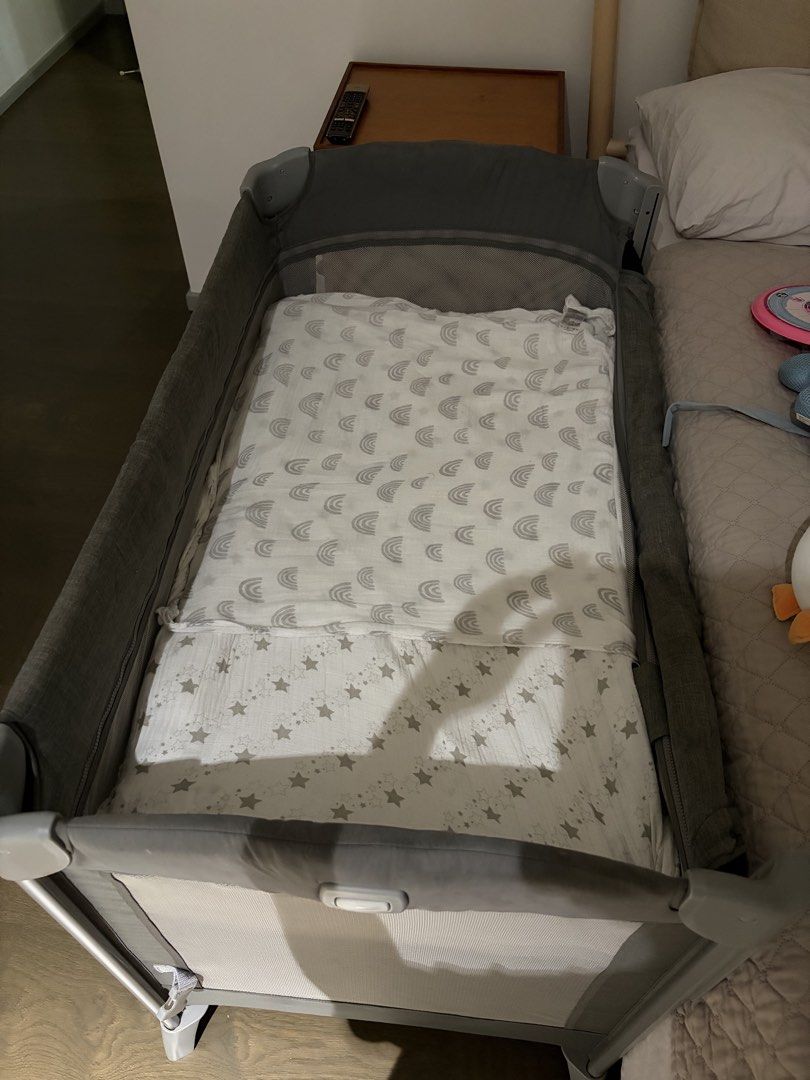 Joie Kubbie Co-Sleeper Crib/Playpen (Category: Cots & Cribs) located in Quezon City. Submitted by absam26 (Listing ID 1461560473, Image 3). Description: - Joie Playpen in Grey - Breathable Mesh Sides for Ventilation - Simple Setup and Fold Mechanism - Includes Comfortable Mattress - Ideal for Home or Travel - Ample Space for Your Child.
