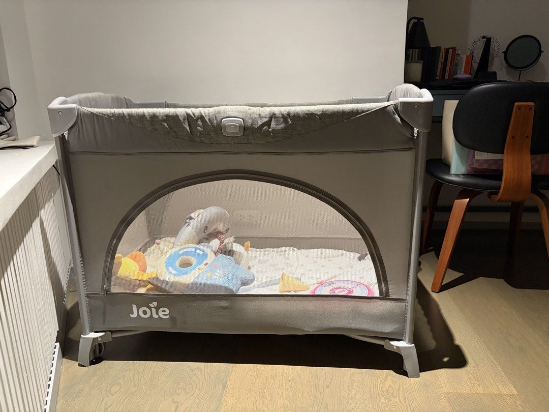 Joie Kubbie Co-Sleeper Crib/Playpen (Category: Cots & Cribs) located in Quezon City. Submitted by absam26 (Listing ID 1461560473, Image 1). Description: - Joie Playpen in Grey - Breathable Mesh Sides for Ventilation - Simple Setup and Fold Mechanism - Includes Comfortable Mattress - Ideal for Home or Travel - Ample Space for Your Child.
