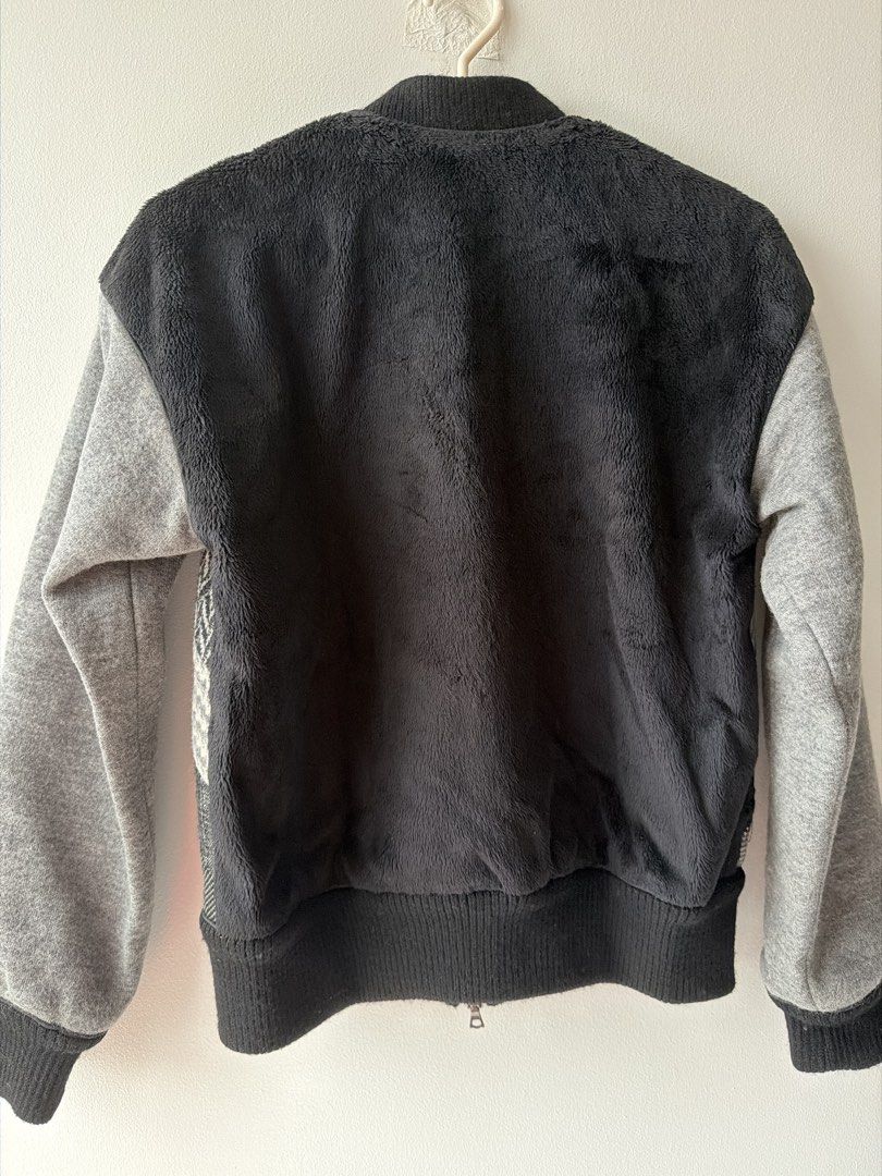 Jonathan Simkhai Patchwork Bomber Jacket - Grey/Black (Category: Coats, Jackets and Outerwear) located in Makati City. Submitted by cheapipie (Listing ID 1461427207, Image 3). Description: - Unique patchwork rabbit fur body bomber jacket. Retails $759 - Features plaid, houndstooth, and herringbone wool material patterns - Grey sleeves and fuzzy black back - Ribbed cuffs and hem for a snug fit - Zipper closure 2 way please check measurement. - Per