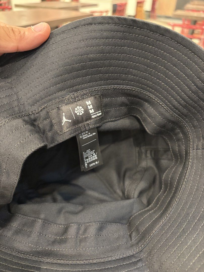 Jordan Bucket Hat - Black (Category: Caps & Hats) located in Manila. Submitted by lucky.beyaaa (Listing ID 1461374950, Image 3). Description: - Black Jordan bucket hat - Size: M - Iconic Jumpman logo with colorful gradient - "Move to Zero" and Nike branding on tag - 100% cotton - Ideal for sunny days and adding style to any outfit.