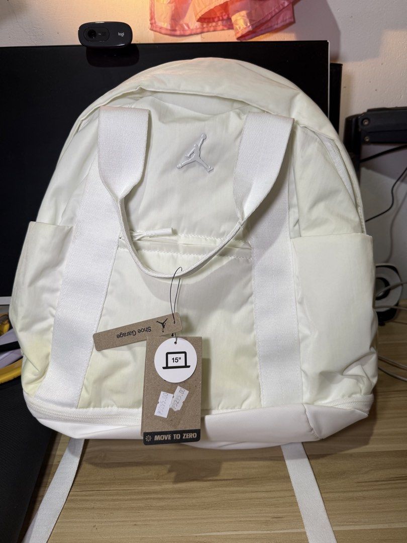 Jordan White Backpack "Move to Zero" 15" Laptop Sleeve (Category: Backpacks) located in Tuguegarao City. Submitted by janurtist (Listing ID 1461492728, Image 1). Description: - White Jordan backpack - Part of the "Move to Zero" collection - Includes a 15" laptop sleeve - Minor yellowing on the sides (please check photos) - Still has original tags attached Issue: Discoloration kasi na stock lang. Pero hindi nagamit. Orig Proce:5,295 Selling Price: