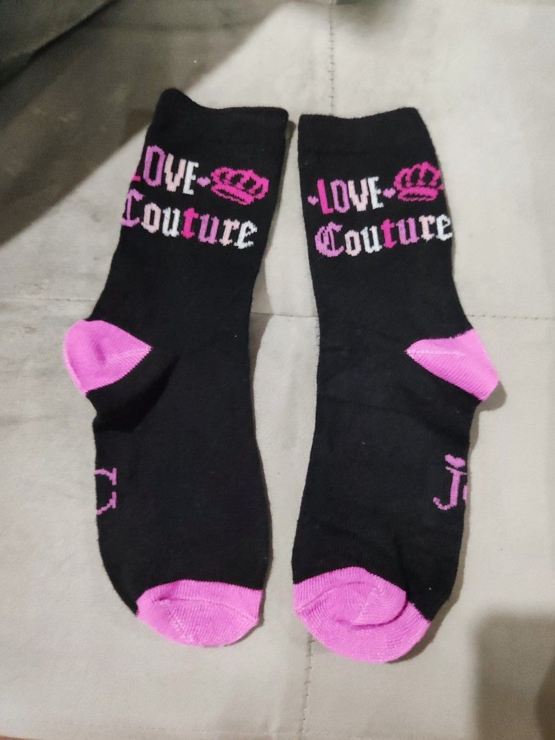 Juicy Couture "LOVE Couture" Socks (Category: Socks & Tights) located in Paniqui. Submitted by arlenepari29210 (Listing ID 1461455525, Image 1). Description: - Black socks with stylish pink accents. - "LOVE Couture" text and crown graphic on top. - "JC" logo detail on the ankle. - Comfortable for all-day wear. - Perfect for adding a touch of style to casual outfits..