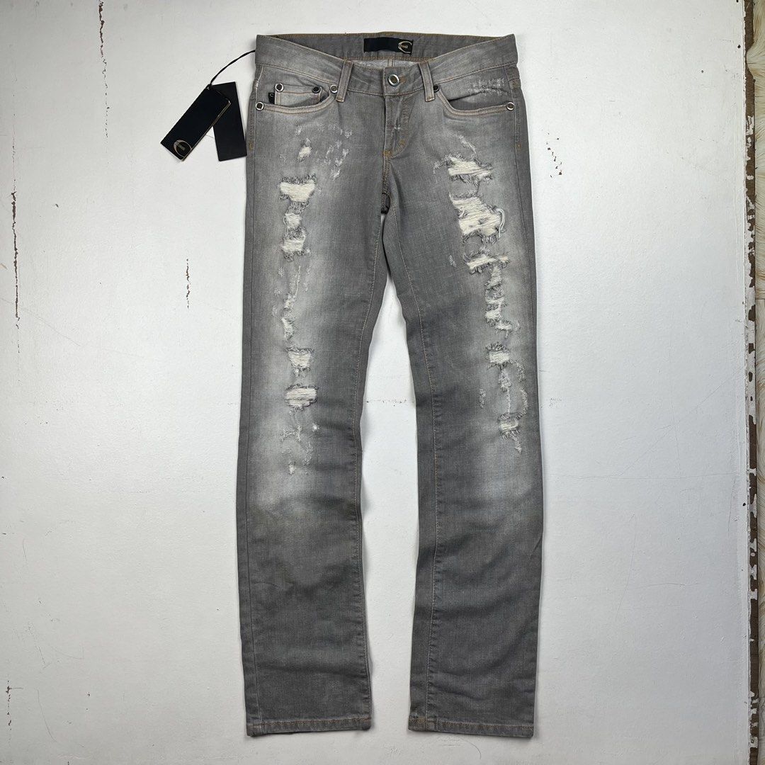 Just Cavalli Grey Distressed Slim Denim Jeans (Category: Jeans) located in Quezon City. Submitted by forgarments (Listing ID 1461415332, Image 1). Description: Just Cavalli Grey Distressed Slim Denim Jeans Excellent Condition with tag - The fabric under the distressing is removed Size: 42 Waist: 30 inches Front rise: 7.5 inches thigh: 10 inches knee: 7.5 inches Inseam: 34 inches Length: 41.5 inches Hem: 7.5 inches A pair of slim-fit denim jeans r