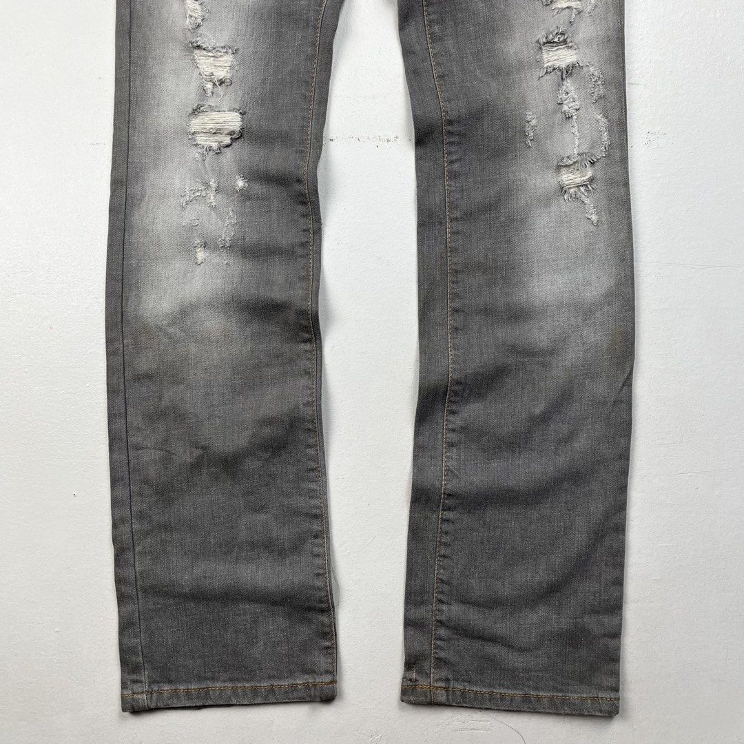 Just Cavalli Grey Distressed Slim Denim Jeans (Category: Jeans) located in Quezon City. Submitted by forgarments (Listing ID 1461415332, Image 2). Description: Just Cavalli Grey Distressed Slim Denim Jeans Excellent Condition with tag - The fabric under the distressing is removed Size: 42 Waist: 30 inches Front rise: 7.5 inches thigh: 10 inches knee: 7.5 inches Inseam: 34 inches Length: 41.5 inches Hem: 7.5 inches A pair of slim-fit denim jeans r