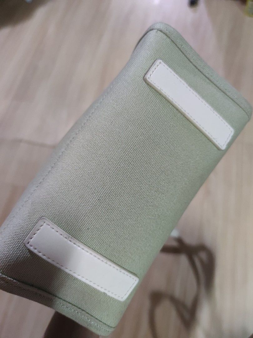 Kangol Tote Bag Canvas Leather Trim, Small (Category: Tote Bags) located in Dagupan City. Submitted by jhazrightshop (Listing ID 1461442345, Image 3). Description: - Light green canvas tote bag by Kangol - Cream leather trim and handles - Detachable shoulder strap included - Iconic kangaroo logo on the front - Small Kangol tag on the side - Ideal for everyday use.