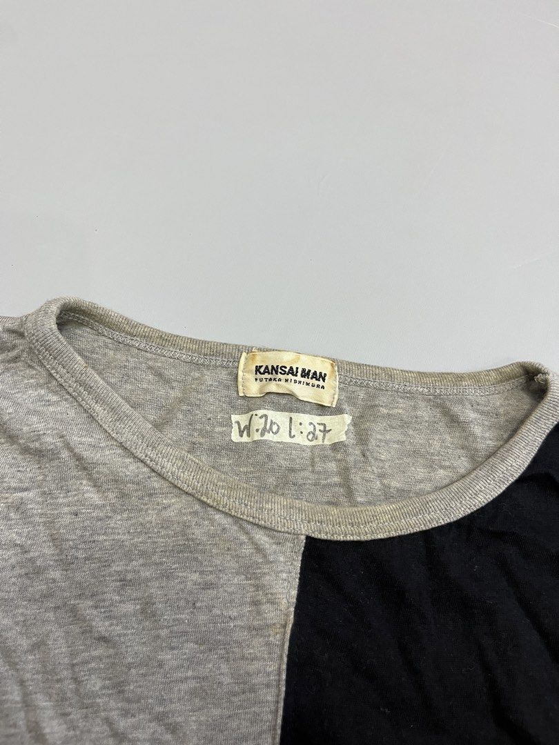 Kansai Man Yamamoto T-shirt Grey Black Split Design (Category: Tshirts & Polo Shirts ) located in Mabalacat. Submitted by aas_thriftfings (Listing ID 1461516613, Image 3). Description: - Authentic Kansai Man t-shirt - Striking grey and black split design - Bold 'Kansai Man' graphic - Features brand's Tokyo address detail - Comfortable cotton blend fabric - Size L (check measurements for best fit) - Ideal statement piece for streetwear enthusiasts