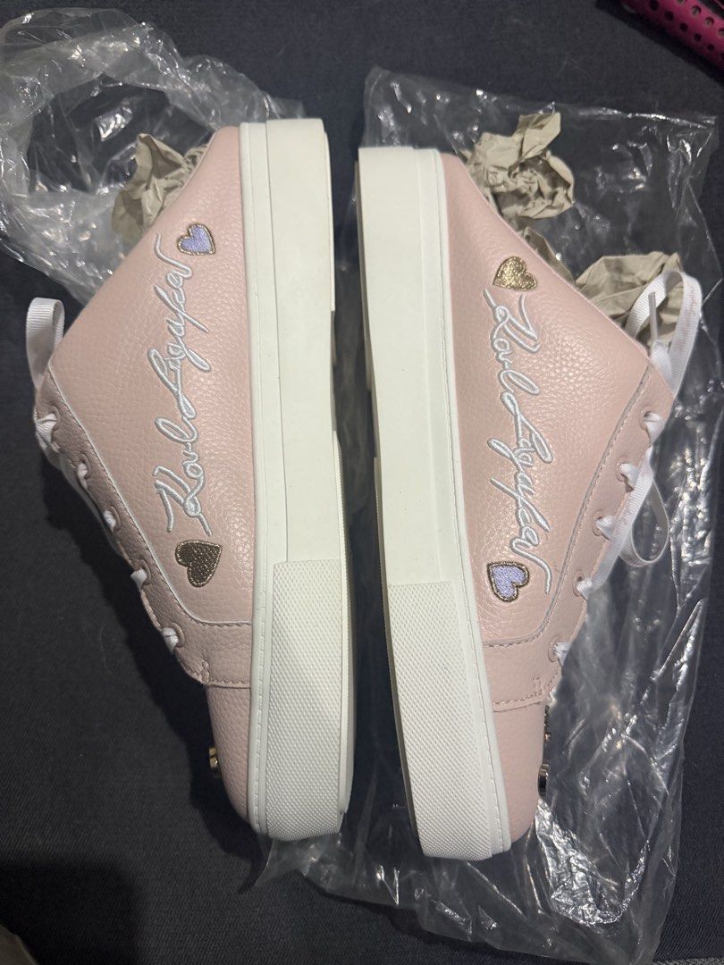 Karl Lagerfeld (Category: Sneakers) located in Marikina City. Submitted by tharyl1824 (Listing ID 1461333312, Image 3). Description: - Adorable pink Karl Lagerfeld sneakers - Features cute charms: sunglasses and hearts - Classic white laces - Chunky white sole for a stylish look - Perfect for adding a fun touch to casual outfits.