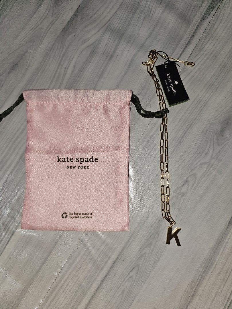 Kate Spade New York Gold Initial Necklace (Category: Necklaces) located in Manila. Submitted by tokyo_thv (Listing ID 1461340986, Image 1). Description: - Genuine Kate Spade gold chain necklace - Features a stylish 'K' initial charm - Comes with original Kate Spade dust bag and tag - Original retail price: $89.00 USD - Makes a wonderful gift idea.