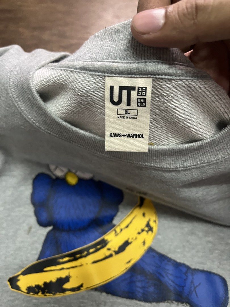 Kaws x Uniqlo Sweatshirt (Category: Coats, Jackets and Outerwear) located in Manila. Submitted by montillano25396 (Listing ID 1461438982, Image 3). Description: Uniqlo x kaws sweatshirt 23.5×29 Excellent Condition Minimal stain P349.