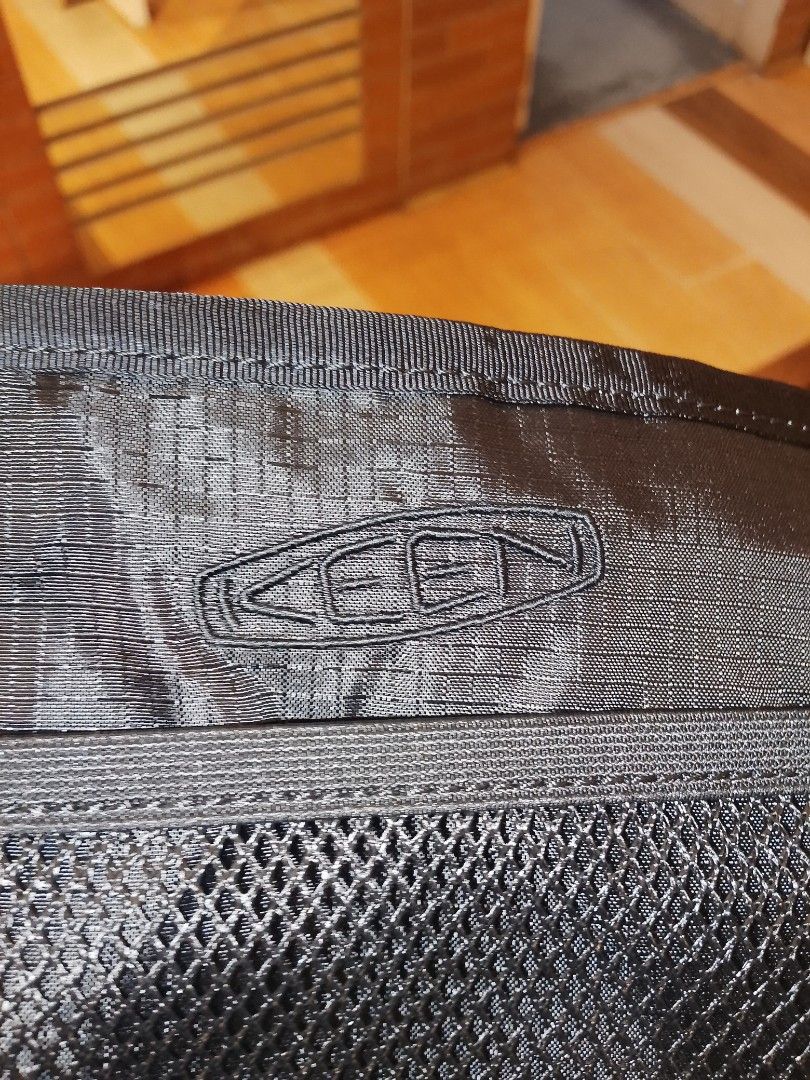 KEEN Repurposed Black Crossbody Bag (Category: Sling Bags) located in Manila. Submitted by capusojohn43359 (Listing ID 1461363340, Image 2). Description: - Brand: KEEN - Type: Crossbody Bag - Color: Black - Material: Repurposed materials - Features: Mesh front pocket, main compartment, adjustable strap, drawstring closure - Ideal for: Everyday use, travel.