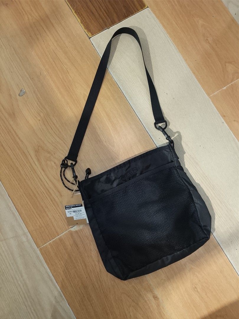 KEEN Repurposed Black Crossbody Bag (Category: Sling Bags) located in Manila. Submitted by capusojohn43359 (Listing ID 1461363340, Image 1). Description: - Brand: KEEN - Type: Crossbody Bag - Color: Black - Material: Repurposed materials - Features: Mesh front pocket, main compartment, adjustable strap, drawstring closure - Ideal for: Everyday use, travel.