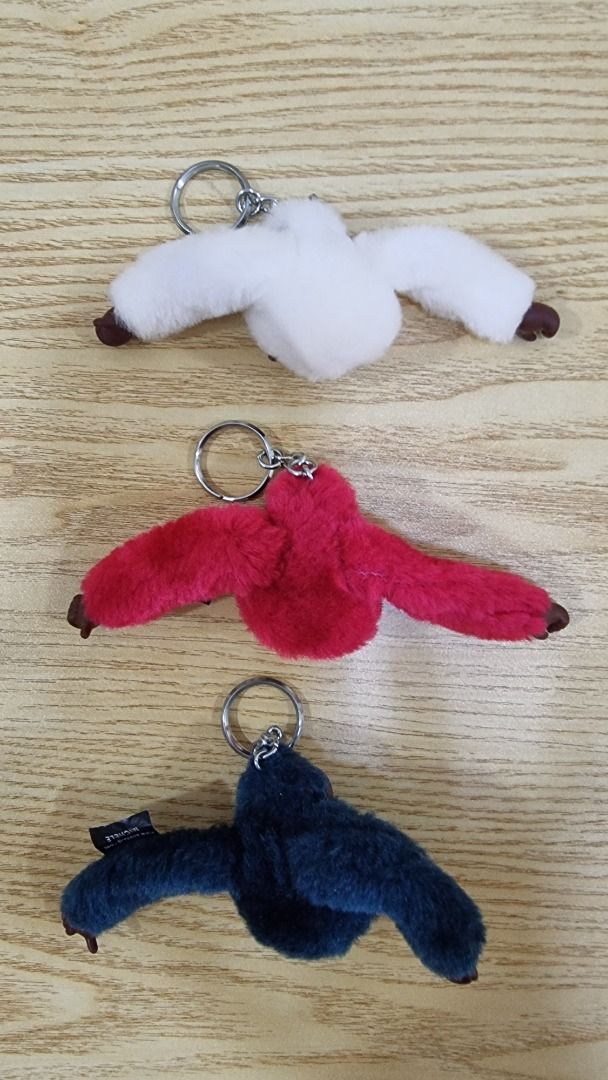 Kipling Monkey Keychains - White, Red, Blue (Category: Charms) located in Paranaque City. Submitted by olxph_668280920 (Listing ID 1461471260, Image 2). Description: Kipling monkey keychains - Colors: White, Red, Dark Blue - Classic fuzzy Kipling monkey design - Features outstretched arms - Includes metal keyrings - Ideal for attaching to bags or keys price per piece great for Christmas gifts.