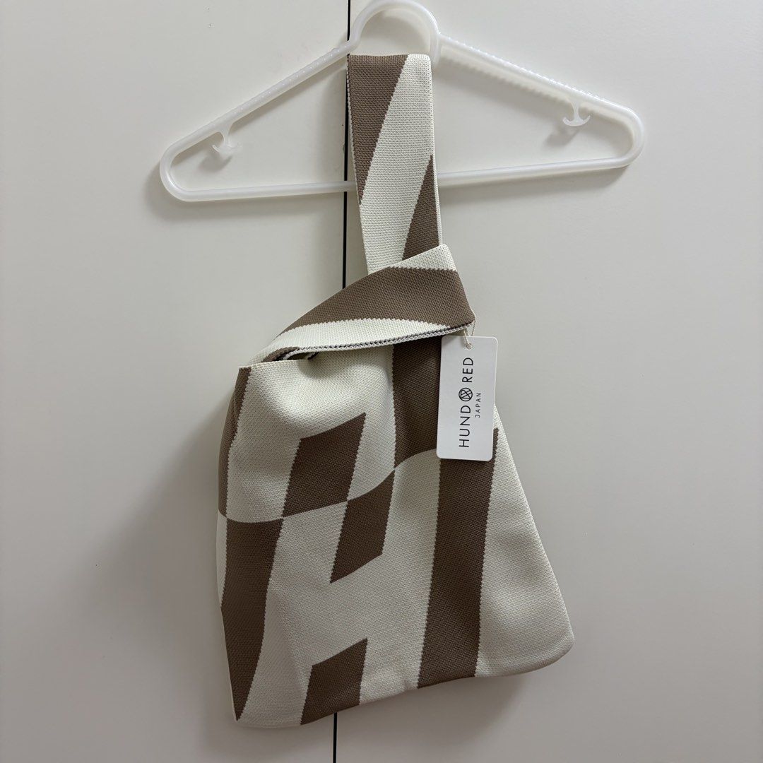 Knit Knot Bag (Category: Tote Bags) located in Paranaque City. Submitted by b.lyka (Listing ID 1461023059, Image 1). Description: Bought in Japan (still with tag) Color: Cream and brown.