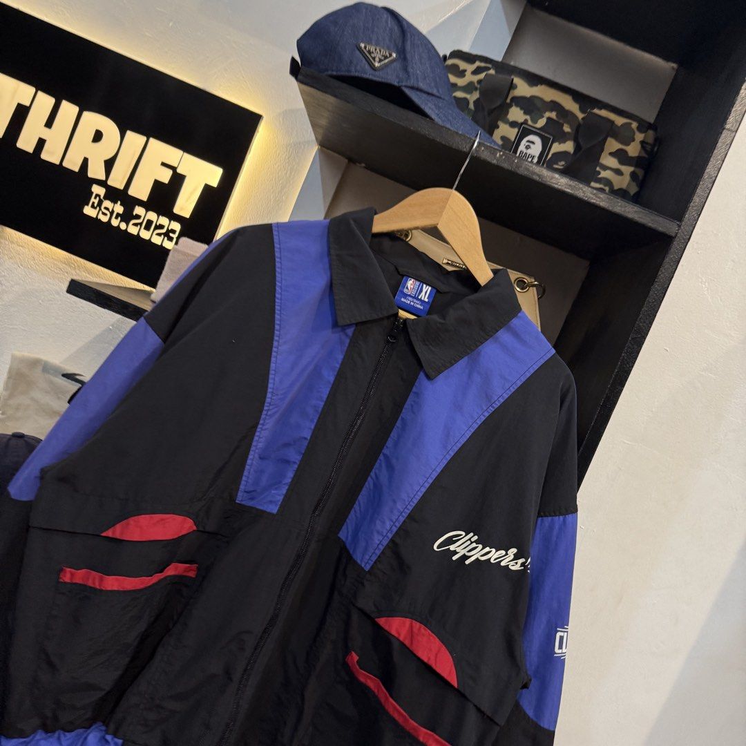 LA Clippers NBA Jacket Black Blue Red (Category: Coats, Jackets and Outerwear) located in Manila. Submitted by carbungcoalex (Listing ID 1461535001, Image 3). Description: NBA CLIPPERS TRITONE WINDBREAKER JACKET 26 by 27.5 Good Condition Complete tags 1500 CLAIM.