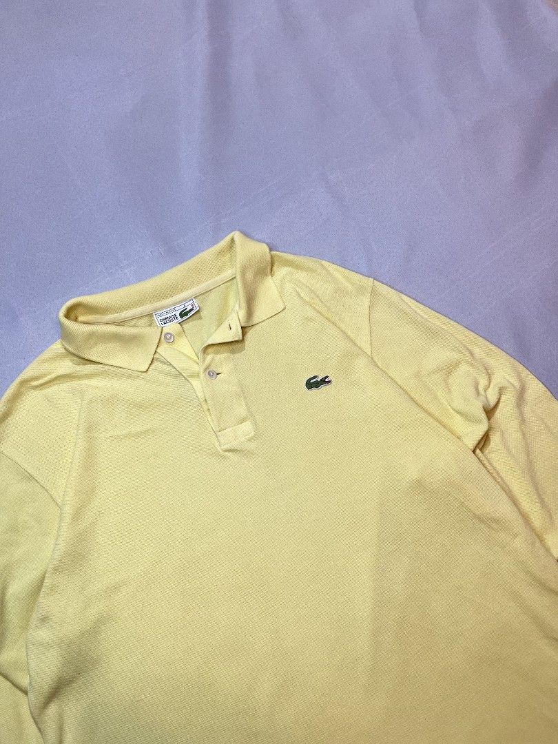 Lacoste long sleeve (Category: Tshirts & Polo Shirts ) located in Cabuyao City. Submitted by grand_vault (Listing ID 1461478381, Image 3). Description: Chemise Lacoste Yellow Long sleeve Size: L Width: 22 Length: 27 Condition: 9/10 Color rate: 10/10 Issue: minimal pinhole.
