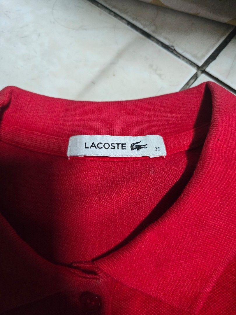 LACOSTE POLO Shirt (Category: Shirts) located in Quezon City. Submitted by thegoodsplanetmnl (Listing ID 1461332010, Image 2). Description: original Lacoste Polo Shirt Color Red size 36 rfs: decluttering.