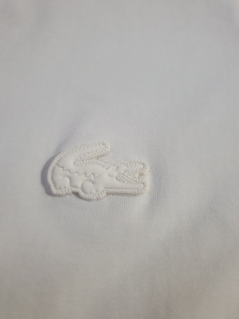Lacoste pure white authentic polo (Category: Tshirts & Polo Shirts ) located in Paranaque City. Submitted by nvdluxurygoods (Listing ID 1461371355, Image 3). Description: puting puti, no flaws, no issue plantsa or steaming para no kusot.