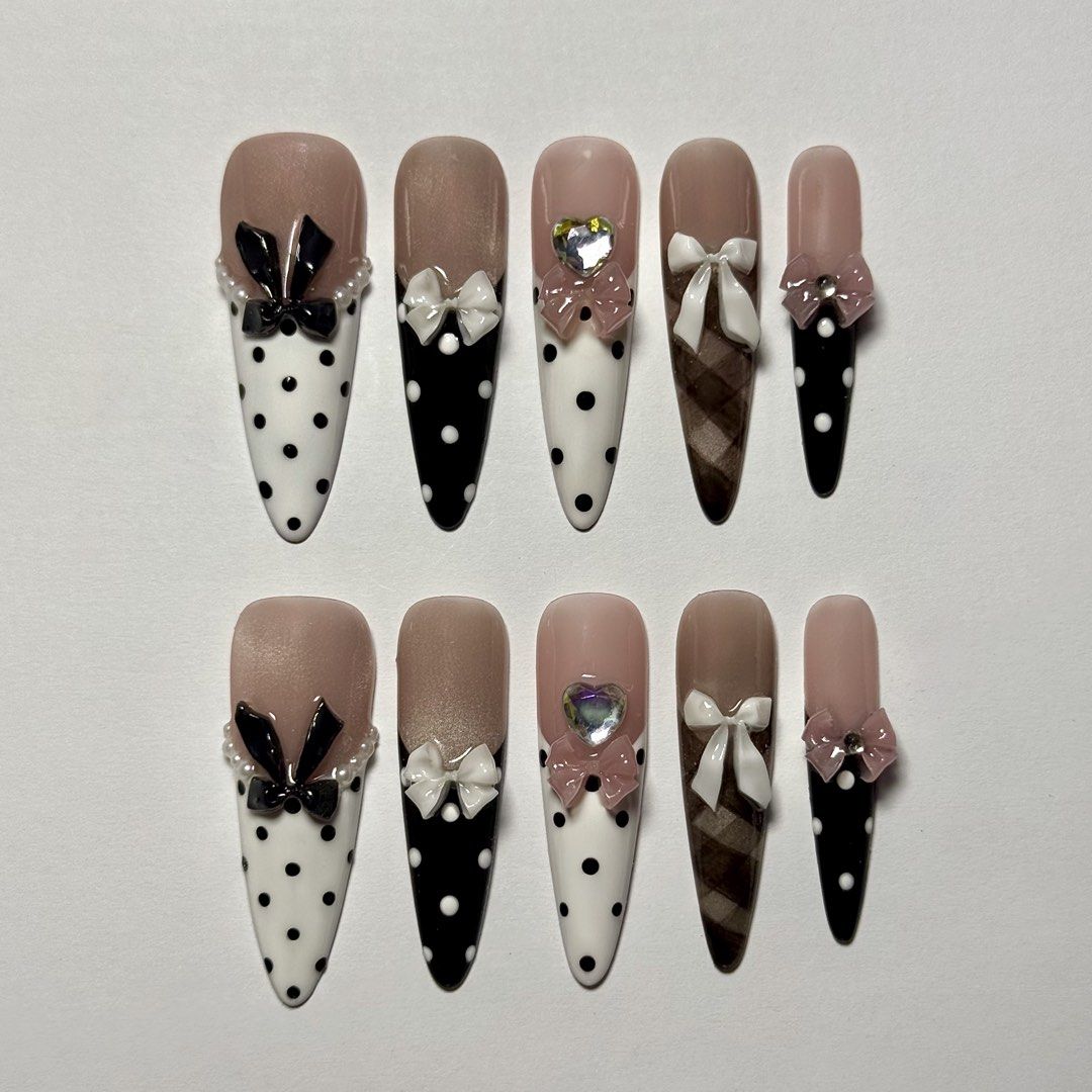 |Large|Bow and Polka dots press-on set🤍✨🖤 (Category: Hands & Nails) located in Manila. Submitted by kitsustudio (Listing ID 1461499098, Image 1). Description: 🎀 READY-TO-SHIP | Long Stiletto Press-On Nails 🎀 A cute, feminine long stiletto set featuring polka dots, bows, and delicate details ✨ Long Stiletto Shape 📏 Size: Large (can file down if needed) 🎀 Bow & Polkadot Design 📦 Ready to Ship 💅 Handmade press-on nail set This set is already
