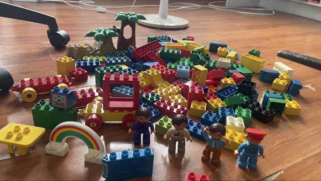 LEGO DUPLO Building Blocks Set with Figures and Accessories (Category: Lego & Building Sets) located in Rizal. Submitted by annelimited_stuffs (Listing ID 1461412206, Image 1). Description: - 128pcs Large collection of LEGO DUPLO blocks - Includes various bricks, figures, trees, and a rainbow piece - Comes with a yellow car base with wheels - Encourages imaginative play and building - Plenty of pieces for hours of fun - Ideal for young children t