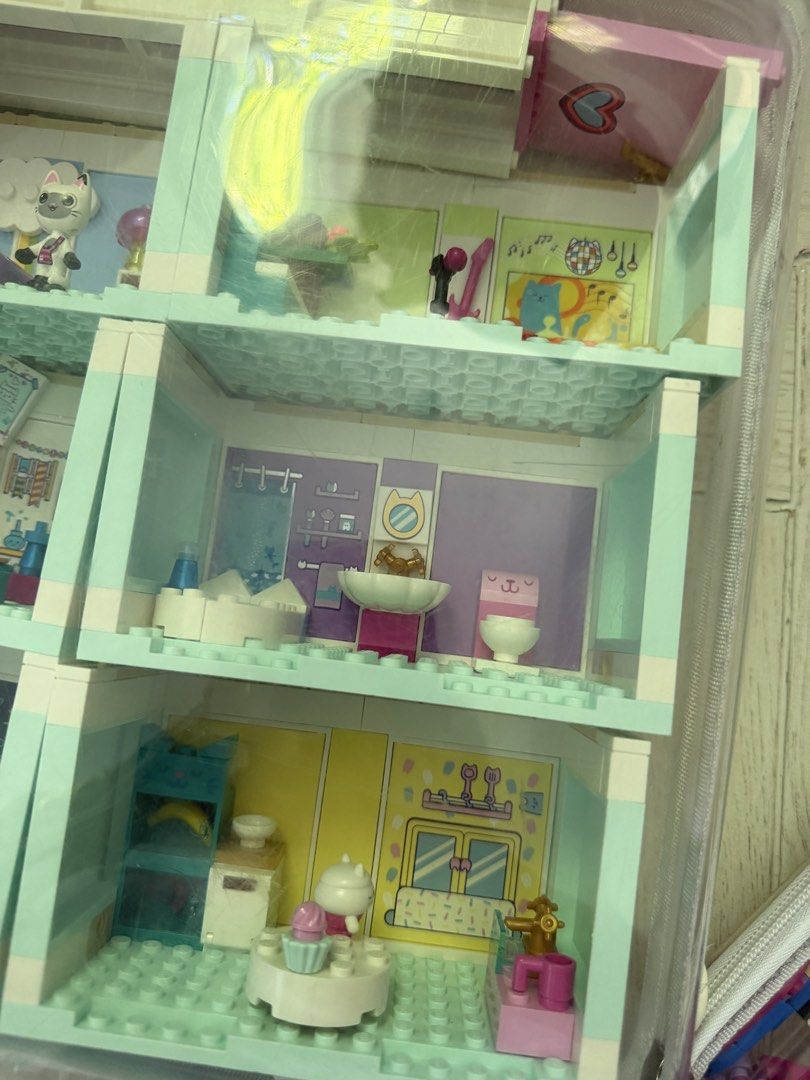 LEGO Gabys DollHouse Complete Set (Category: Lego & Building Sets) located in Makati City. Submitted by imwinniewong (Listing ID 1461451136, Image 3). Description: -Complete Building Set -Missing two small items - comes with instruction book - All pieces neatly stored in a clear zip case.