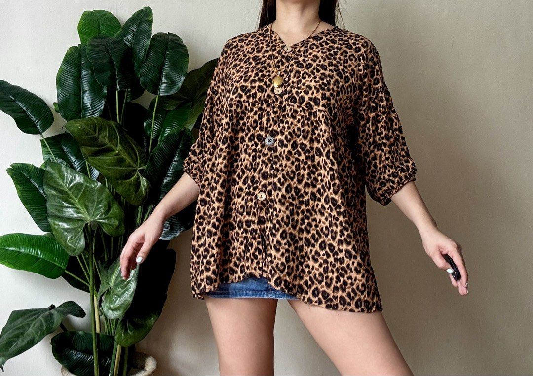 Leopard Print Button-Up Blouse Top,l to xxl (Category: Blouses) located in Mandaluyong City. Submitted by roxieeeeeee (Listing ID 1461498868, Image 3). Description: - Cute leopard print - V-neck with button details - Loose fit - Short sleeves - Versatile for casual outfits with shorts or jeans ✅ Like new condition ✅ Ships 1 day after payment ✅ Please allow 1 day for preparation (wash, dry, iron) Items are ready to wear upon arrival ✅ Payment cut-