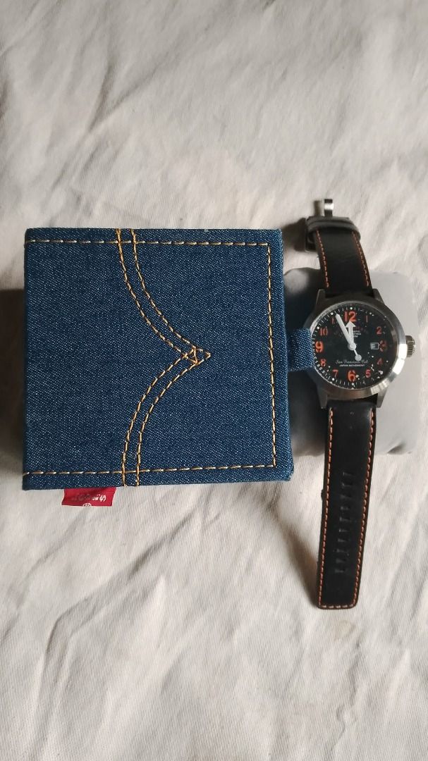 Levi Strauss & Co. LTD0403 (Category: Luxury Watches) located in Manila. Submitted by balaiheritage.ph (Listing ID 1461505233, Image 3). Description: Selling my Levi Strauss & Co. LTD0403 analog watch with its original Levi’s denim-style presentation box. The watch features a distinctive black dial with orange numerals, black leather strap with orange stitching, stainless-steel case, and classic Levi’s styling. A nice piece for collectors, Levi’s