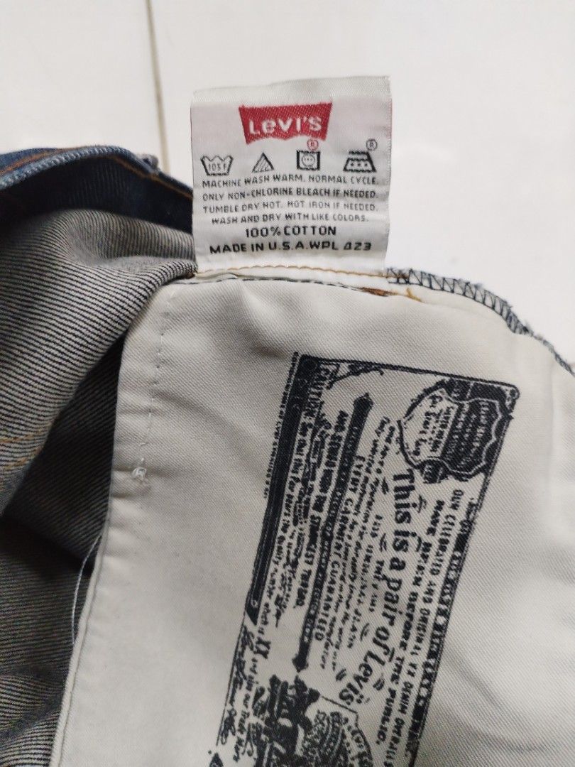 "Levi's 501" Jeans Dark Wash (Category: Jeans) located in Mendez-Nunez. Submitted by eidryl2006 (Listing ID 1461536736, Image 3). Description: - Classic Levi's 501 jeans - Dark wash denim - Button fly closure - Made in USA -"Vintage" according sa tag - Size: 30 waist, 32 length - Wardrobe staple for casual wear -Selling as is -Authenticity not verified -Zara, Bershka, Ralph Lauren, Balenciage, Iphone 13, Dehumidifier.