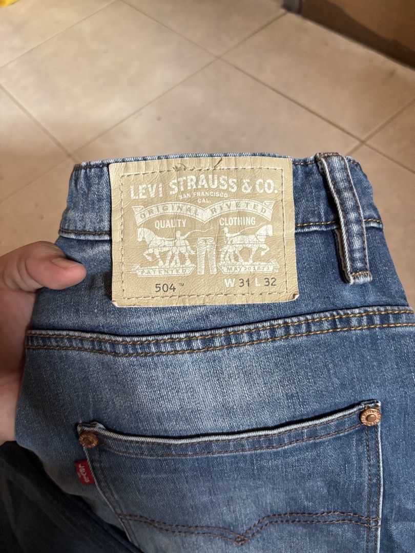 Levi's 504 Jeans W31 L32 (Category: Jeans) located in Manila. Submitted by manifest_05 (Listing ID 1461328843, Image 2). Description: - Classic Levi's 504 Jeans - Size: W31 L32 - Fit: Straight - Wash: Medium blue with fading - Material: Durable denim - Perfect for everyday wear.