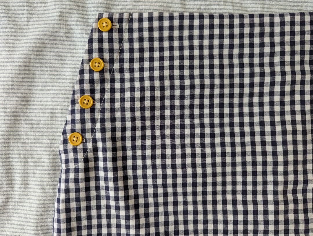 LIBÉ WORKSHOP Gingham Checked Side-Button Wrap Skort (Navy/White) - Thai Boutique [Size: M] (Category: Skirts) located in Cebu City. Submitted by anemonemone (Listing ID 1461427187, Image 2). Description: Color: Dark Navy Blue and Crisp White Gingham Checks with Mustard Yellow buttons Decluttering..