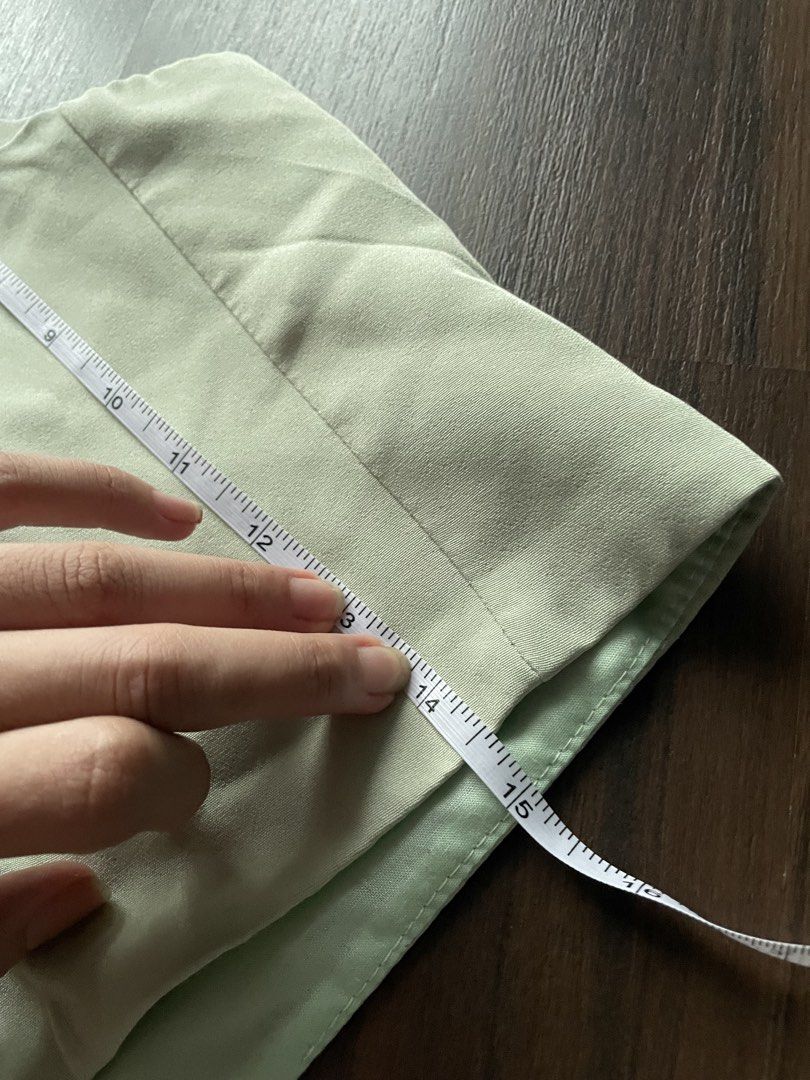 Light green Vest cropped button down (Category: Others Tops) located in Quezon City. Submitted by andreaaa_______ (Listing ID 1461429300, Image 3). Description: - second hand manage expectations - measurements in photos no more tag so idk size or brand few pulled threads - Features a classic two-button front closure. .