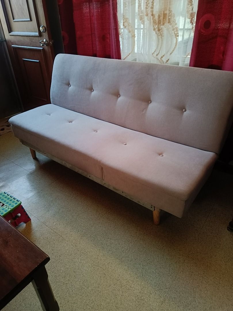 Light Grey Tufted Sofa Bed 2-Way Fold (Category: Sofas) located in Carmona. Submitted by estelle01 (Listing ID 1461423269, Image 2). Description: - Light grey sofa bed with tufted backrest and seat - 2-way fold: (1) standard sofa (2) longer leg room - Features sturdy wooden legs - Ideal for small apartments or rooms - Comfortably seats 2-3 people as a sofa Pick-Up only: Faith Street, Cityland Subdivision, Carmona, Cavite PH 4116.