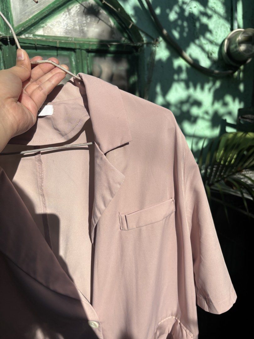 Light Pink Oversized Blazer with Short Sleeves (Category: Coats, Jackets and Outerwear) located in Caloocan City. Submitted by alnair7 (Listing ID 1461560702, Image 2). Description: - Oversized blazer - Light pink shade - Short sleeves - Single button closure - Two front pockets with flap details - Ideal for layering over tops or dresses - Versatile for casual or semi-formal styling - Flowy.