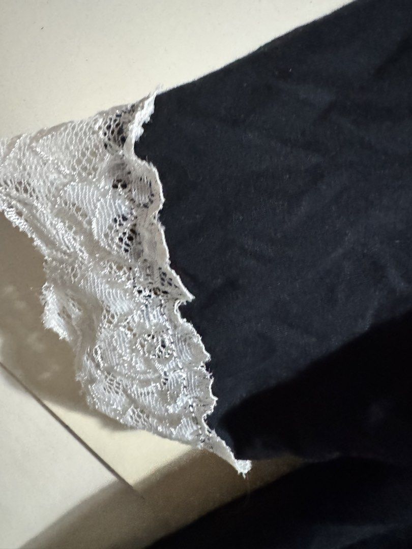 Linen & Homes Black Lace Trim Robe (Category: Undergarments & Loungewear) located in Mandaluyong City. Submitted by spaceshipshop (Listing ID 1461461196, Image 2). Description: - Black robe with elegant white lace trim on sleeves - Secure tie closure at the front - Made from lightweight material for ultimate comfort - Ideal for relaxing and lounging at home - Size: Large (L).
