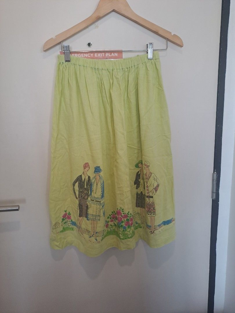 Linen skirt vintage design (Category: Skirts) located in Manila. Submitted by joanbalde39643 (Listing ID 1461425453, Image 1). Description: This item is a lime green midi-length skirt featuring a distinctive 1920s Art Deco "Flapper Girl" novelty border print along the bottom hem. Design FeaturesSilhouette: It has a relaxed A-line shape with a comfortable, gathered elastic waistband..