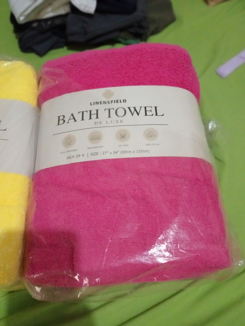 Pack of 4 or 6 Bath Towels (Category: Bedding & Towels) located in Makati City. Submitted by YSL80022 (Listing ID 1461425351, Image 2). Description: - Set of 3 Linensfield De Luxe Bath Towels - Colors: White, Yellow, Bright Pink - Size: 27" x 54" (69cm x 137cm) - Material: 100% Cotton - Features: Highly absorbent, fade resistant, lint-free - Perfect for upgrading your bathroom Price: Yellow & Pink packs Php400 per set of 4 towels, will not sell i