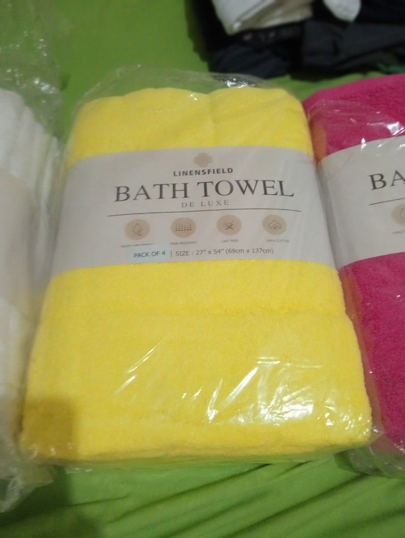 Pack of 4 or 6 Bath Towels (Category: Bedding & Towels) located in Makati City. Submitted by YSL80022 (Listing ID 1461425351, Image 3). Description: - Set of 3 Linensfield De Luxe Bath Towels - Colors: White, Yellow, Bright Pink - Size: 27" x 54" (69cm x 137cm) - Material: 100% Cotton - Features: Highly absorbent, fade resistant, lint-free - Perfect for upgrading your bathroom Price: Yellow & Pink packs Php400 per set of 4 towels, will not sell i