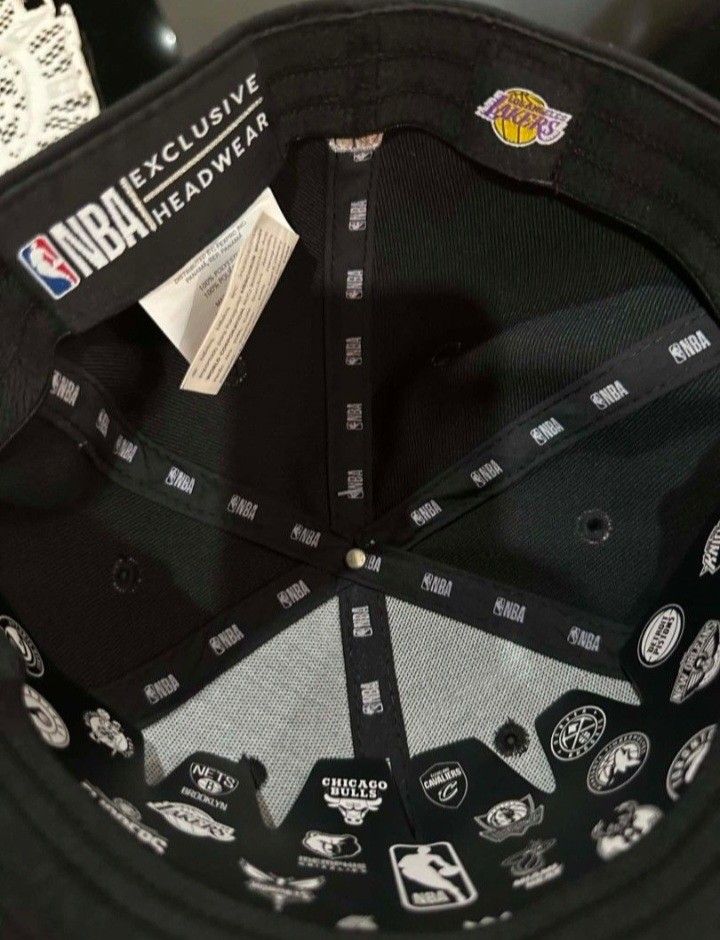 Los Angeles LAKERS AUTHENTIC HEADGEAR (Category: Activewear) located in Manila. Submitted by noblecrystal2026 (Listing ID 1461370840, Image 3). Description: BRANDNEW ORIGINAL WITH RECEIPT SIZE: ONE SIZE FITS MOST SHIPS NATIONWIDE DESCRIPTION; - black Los Angeles Lakers - Features the iconic Lakers logo embroidered on the front. - MLB logo embroidered on the back. - NBA Authentic Headwear. - Original tags still attached. - Perfect for any Lakers f