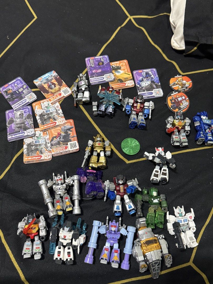 Lot of Transformers Mini Action Figures (Category: Figurines & Statues) located in Bacolod City. Submitted by gewd_finds (Listing ID 1461335187, Image 2). Description: - Collection of Transformers mini action figures - Includes both Autobots and Decepticons - Figures are in various modes (robot and vehicle) - Small, collectible size, perfect for display - Ideal for any Transformers fan or collector - Please check photos to see all included charac