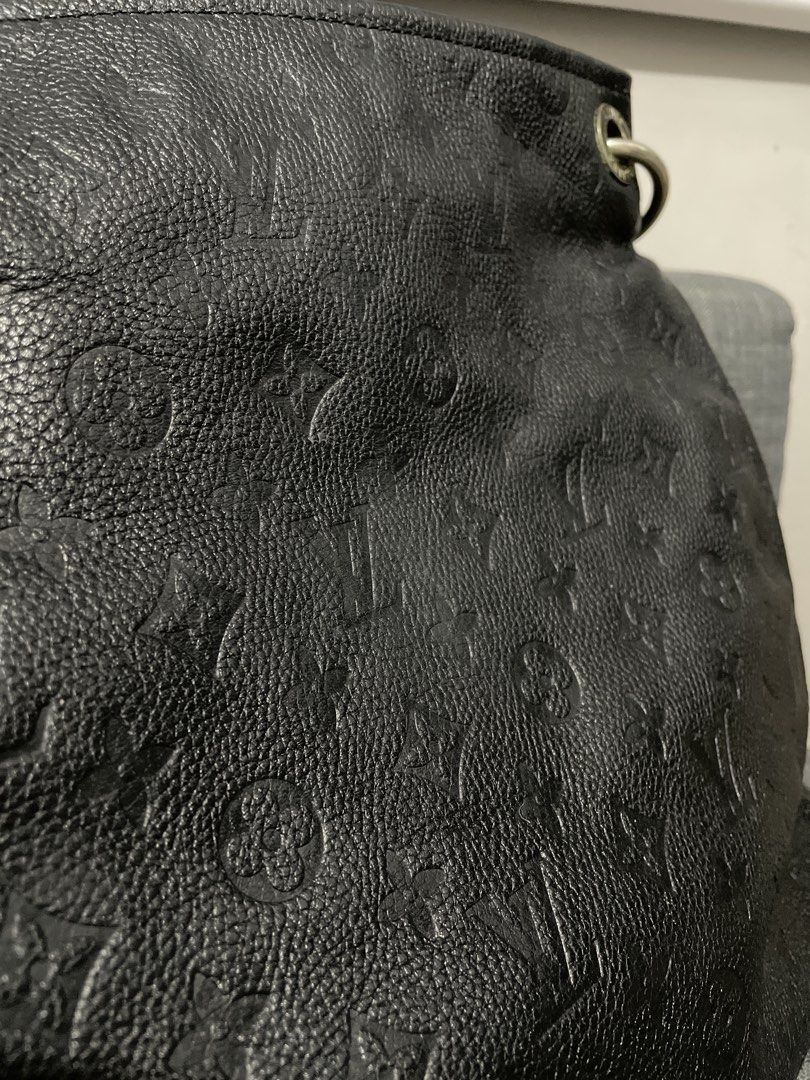 Louis Vuitton Black Monogram Leather Shoulder Bag (Category: Luxury Bags & Wallets) located in Pasig City. Submitted by roseyyylife (Listing ID 1461469214, Image 3). Description: Black Louis Vuitton shoulder bag. Textured leather with embossed monogram pattern. Braided handle detail. Gold hardware, including a LV charm. Zipper closure. Interior is clean. Great everyday bag..