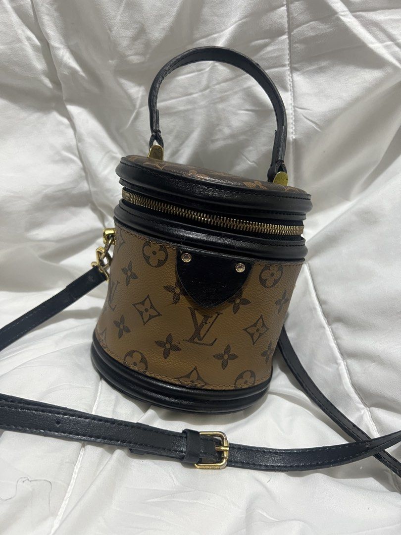 Louis Vuitton Cannes Monogram Vanity Case Bag (Category: Luxury Bags & Wallets) located in Pasig City. Submitted by madiesbags (Listing ID 1461544579, Image 2). Description: - Louis Vuitton monogram - Classic monogram canvas with black leather trim - Secure zipper closure - Features a top handle and a detachable shoulder strap - Elegant gold hardware details - Interior lined with black fabric - Ideal for travel or everyday organization.